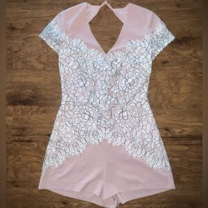 Bebe Women’s Floral Lace Romper